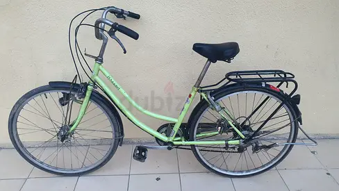 Green city commuter bicycle - sturdy step-through frame, ready to ride