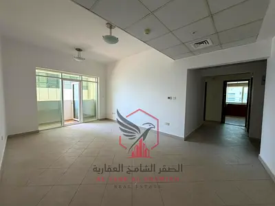 **Spacious 2 Master Bedroom apartment for annual rent in Al Majaz 1, Sharjah. Balcony, spacious layout, central AC, free maintenance, near Dubai Exit.