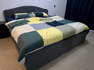 URGENT! Transport is free: King-size grey fabric bed + mattress with storage