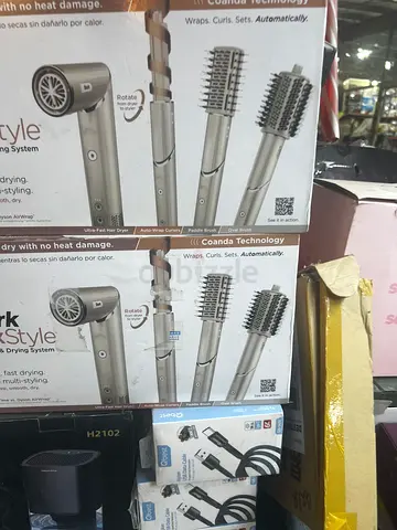 Hair styler set with multiple brush and barrel attachments (like Airwrap) - used