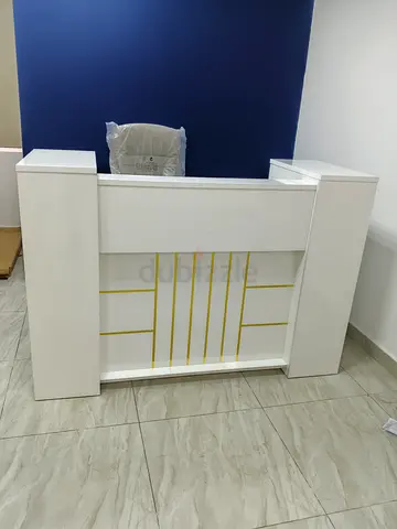 White Reception Desk with Gold Accent