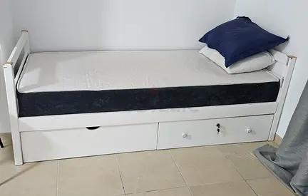 2 White single beds with storage drawers and mattress