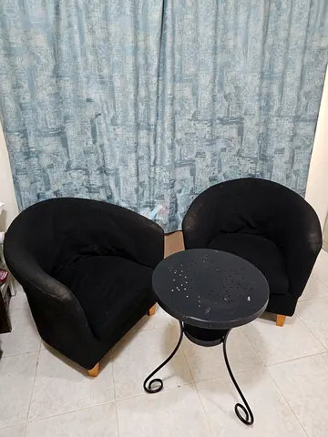 Black sofa chairs with Table from Home Centre
