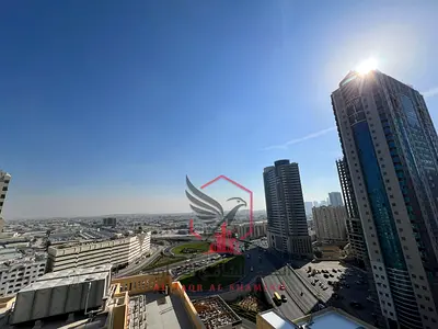 2BR hotel-style apartment in Al Majaz 2 with free AC and free parking. Prime, vibrant location near all services with easy access to Dubai.