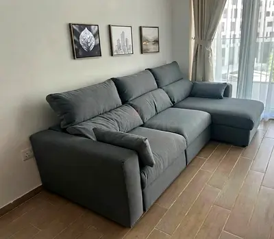 Durable wooden frame with high-density foam cushions. Converts into a comfortable bed with built-in