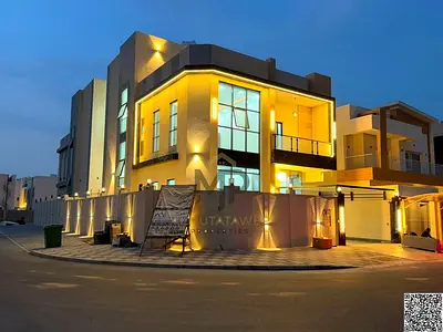 Corner villa in Ajman | Al Yasmin area | 6 main rooms, majlis, 2 halls, roof | Freehold ownership f
