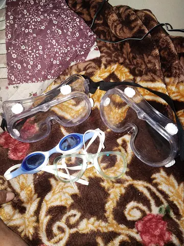 Two clear safety goggles + pair of swimming goggles - good used condition