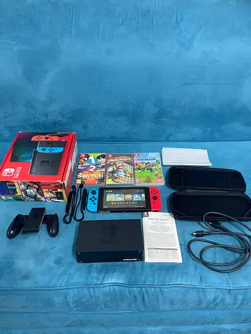 Nintendo Switch with 3 game