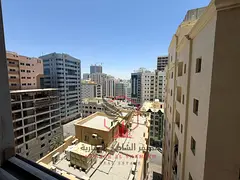 1BR apartment for rent in Al Qasimia Al Mahatta, free AC, stunning view, clean family tower.