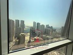 Beautiful sea view, one bedroom and living room, excellent finishing, easy access to Dubai, payment 