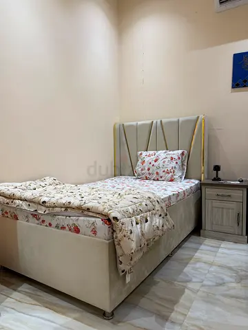 Single bed with medical mattress