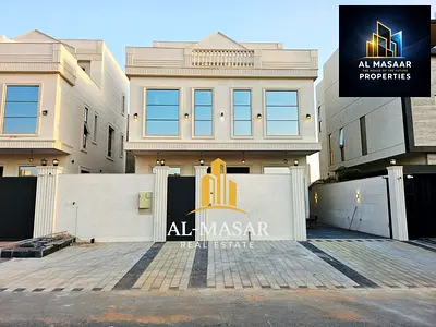 Villa in Al Yasmin, excellent location, freehold ownership, includes electricity, water, and air conditioning.