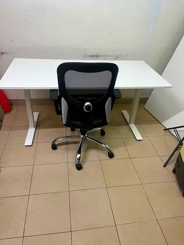 White standing desk with ergonomic mesh office chair - good condition