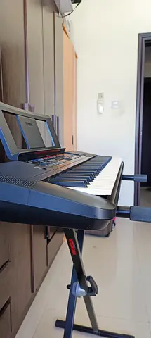 Portable Yamaha Electronic Keyboard with Stand & book holder- Good Condition
