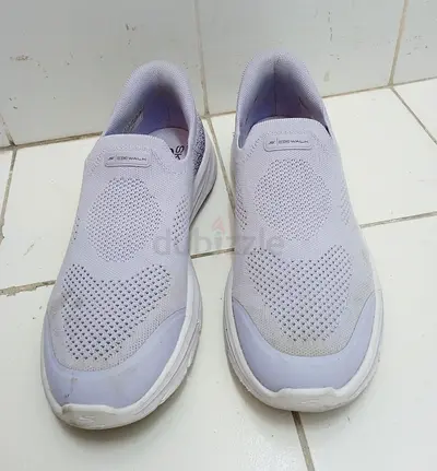 Light grey slip-on Skechers walking shoes, size 39