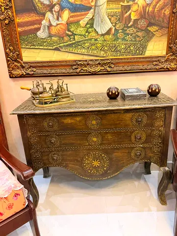 The one Hand-carved Antique-style Wooden Chest/Console with Brass Inlay