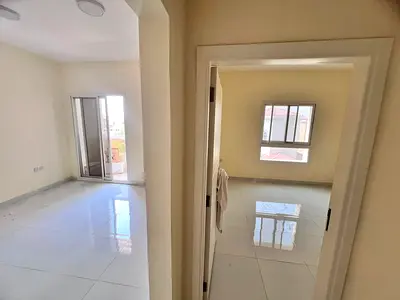 In the tranquility of Khartoum Street in Rawda 3, a story of luxurious love unfolds. A spacious one-bedroom apartment with a living room, two bathroom