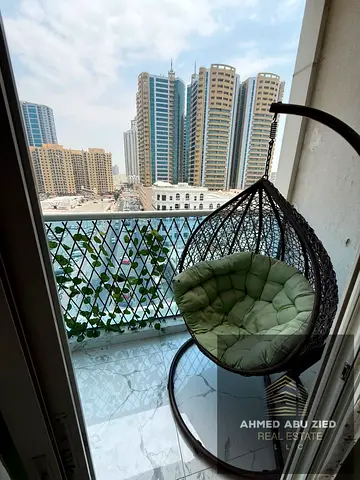 Luxury 2BHK, fully furnished living room in Oasis Towers - Ajman, luxury finishes, 3 bathrooms, bal