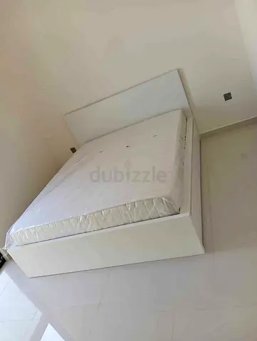 IKEA king Malm storage bed frame with IKEA mattress