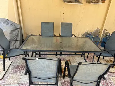 Outdoor 6-Seater Glass Top Dining Table with Mesh Chairs and 1 table without chairs