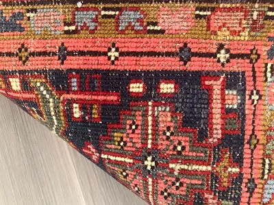 Used Persian (HERIZ) area rug — good condition, 2.35x3.25m