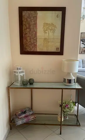 Glass Top Console Table with a paint and accessories - Slim Entry Hall Table
