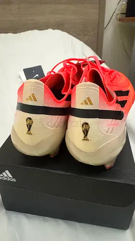 football boots (size 45) — not used, good condition, World Cup logo,rep.