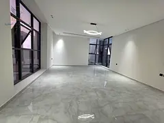 Luxury villa for annual rent in Al Helio 2, Ajman, corner location on two streets, with swimming poo