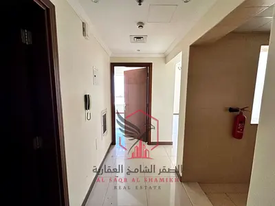 **Spacious 1-Bedroom Apartment for Annual Rent – Al Qasimia, Sharjah.** Modern open-plan kitchen, spacious layout, central AC, free maintenance,