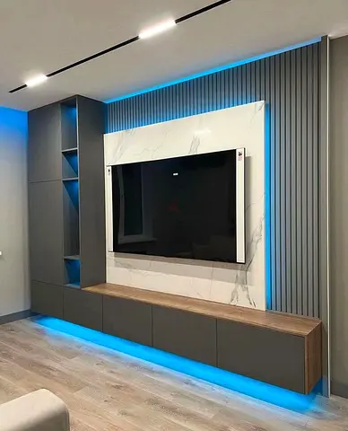 Modern wall-mounted entertainment unit with LED lighting - good condition