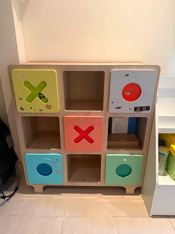 Wooden 9-Cubby Nursery Storage Unit with Colorful Doors