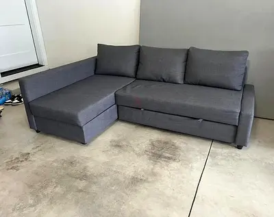 Grey L-shaped Sofa Bed with Storage - Good Condition