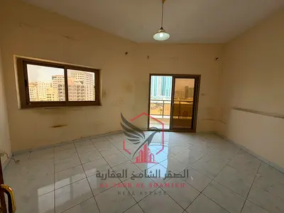 غرفتين وصالة مع بلكونة إطلالة مفتوحة تكييف مركزي 4 شيكات مساحات واسعة سكن عائلي بالقرب من مخرج دبي وشارع الملك فيصل