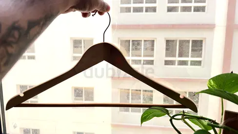 Solid wooden coat hanger - single, good condition