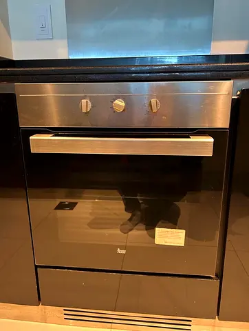 Built-in electric oven (Teka) + matching Hood