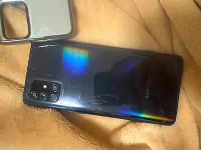 Used Samsung smartphone with case - good working condition