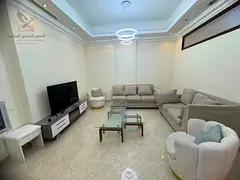 Furnished three-bedroom apartment in Al Rawda 3, new furniture, three bathrooms, fully equipped, nea