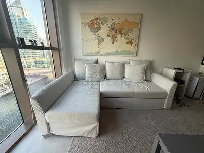 Light grey L-shaped Sofa with Removable Covers - Good Condition