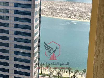 اطلالة بحرية اجمل غرفتين وصالة مع باركن + جيم ومسبح مجانا خزائن بالحائط للايجار في الخان