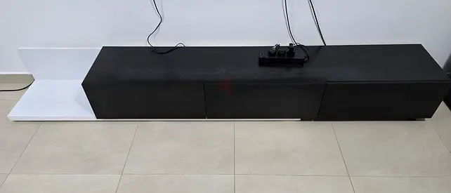 Low-profile modern TV cabinet with white shelf