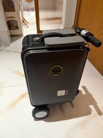Small hard-shell carry-on roller suitcase in black (good condition). 1000 AED each one