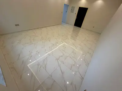 Two bedrooms, living room, two bathrooms, one balcony, central air conditioning, free maintenance, Ajman Corniche