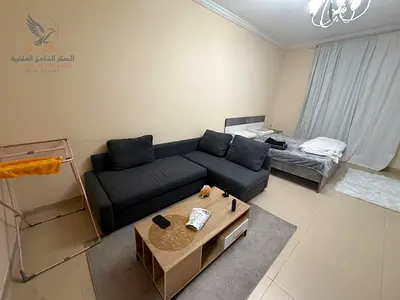 Furnished studio for rent in Al Yasmeen Towers, Ajman, fully equipped with all bills included and parking card, ready to move in near services.