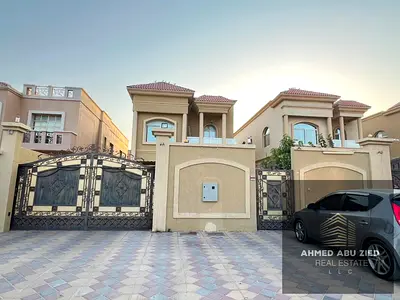 Villa for rent in Al Rawda 1, 5000 sq ft, opposite Waldam Berk Schools, featuring 5 bedrooms, majlis, hall and a large yard, third tenant, annual rent