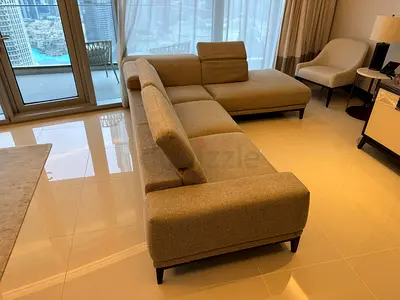 Looks great Condition Natuzzi Italian L Shape Sofa with adjustable head Rest