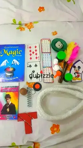 Kids magic trick set with cards, rope, props — used