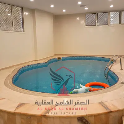 أجمل شقة للإيجار السنوي غرفة وصالة تكييف مركزي مع خدمات جيم ومسبح مجانا في القاسمية الند