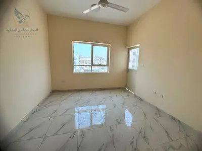 Two bedrooms and a living room, first occupancy, with a balcony, central air conditioning, and an open view.