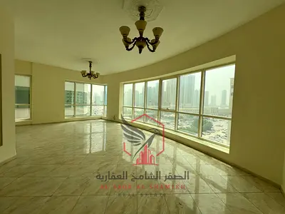 Spacious apartment for annual rent in Al Majaz 3, 3 bedrooms, living room, free air conditioning, free parking, free gym and swimming pool, central ai