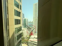 2BR apartment with built-in wardrobes, open view, landlord-paid A/C, free gym & pool, 1 month free, 